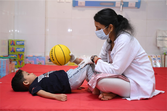 Therapist working with child