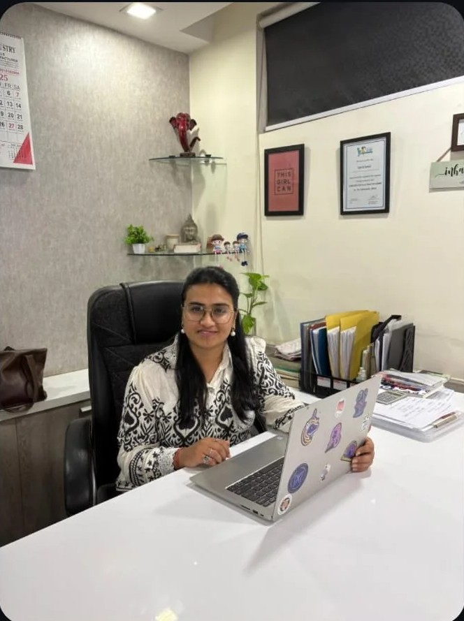 Therapist supporting a child during a session at Beyond Therapy